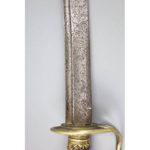 24 - A late 17th century military hangar sword, with brass hilt, antler handle and blade engraved with cl... 