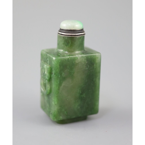 255A - A good Chinese spinach green jade rectangular snuff bottle, 18th/19th century, the sides carved in r... 