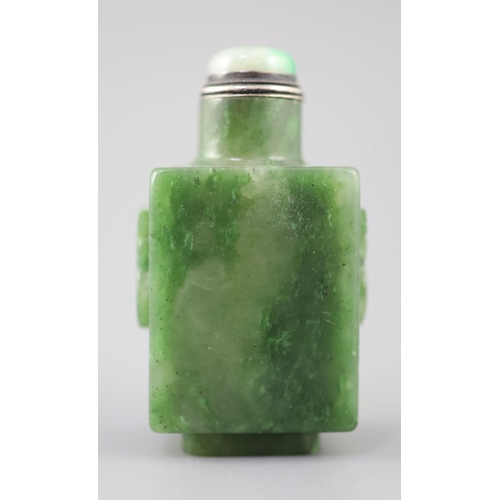 255A - A good Chinese spinach green jade rectangular snuff bottle, 18th/19th century, the sides carved in r... 