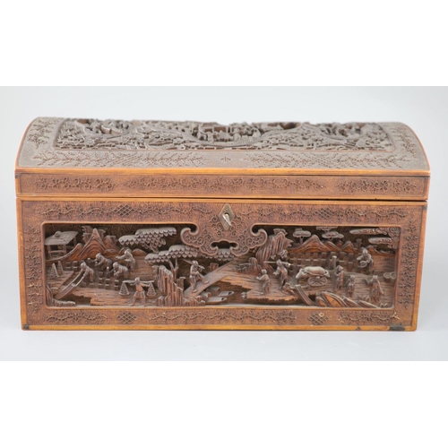 258 - A large Chinese carved sandalwood box, 19th century, the domed top and sides carved in high relief a... 