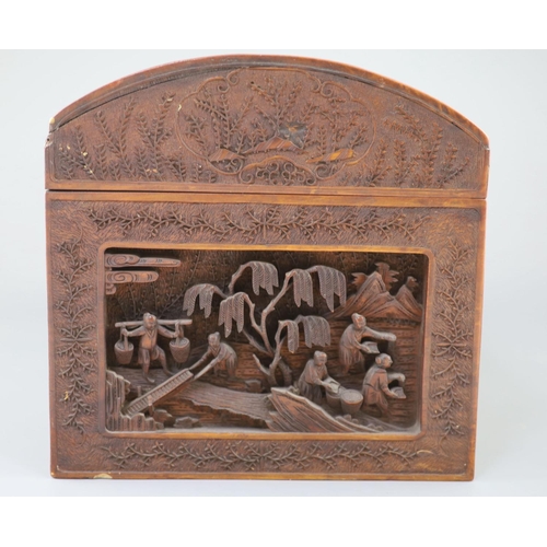 258 - A large Chinese carved sandalwood box, 19th century, the domed top and sides carved in high relief a... 