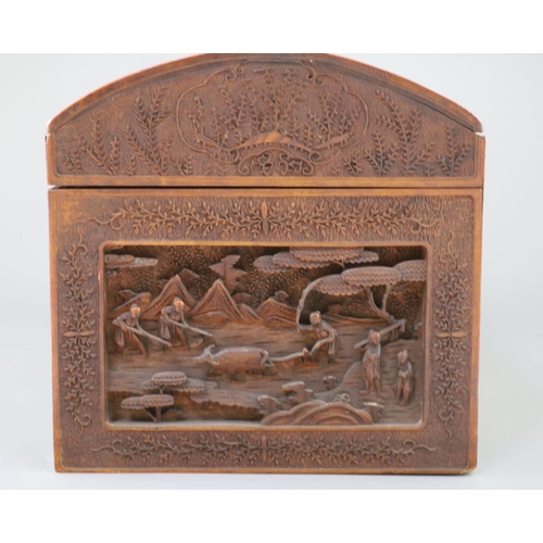 258 - A large Chinese carved sandalwood box, 19th century, the domed top and sides carved in high relief a... 