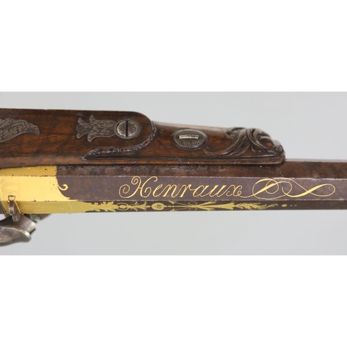 26 - A late 18th/ early 19th century French gold inlaid pistol by Henraux with finely carved walnut stock... 