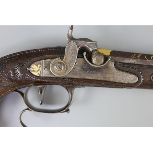 26 - A late 18th/ early 19th century French gold inlaid pistol by Henraux with finely carved walnut stock... 