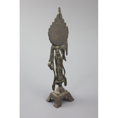 275 - A Chinese bronze figure of a Bodhisattva, Tang style, the flaming mandorla faintly inscribed, 22.5cm... 