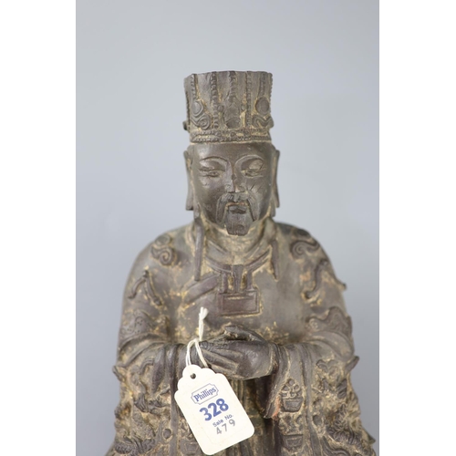 276 - A Chinese Daoist bronze seated figure of Wenchang Wang, late Ming dynasty, his robes cast in relief ... 