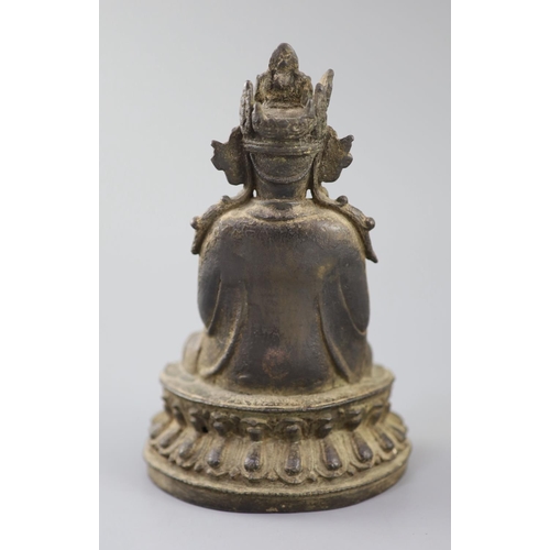 277 - A Chinese bronze figure Amitayus, 17th century, the crowned figure holding his hands in dhyana mudra... 