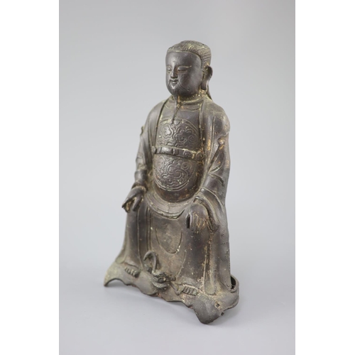 278 - A Chinese bronze seated figure of Zhenwu, late Ming dynasty, wearing robes, the base with snake, rem... 