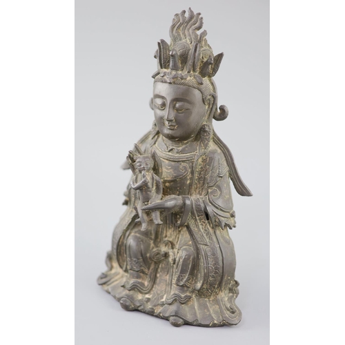 280 - A Chinese bronze seated figure of Xi Wangmu, Queen Mother of the West, 15th/16th century, Ming Dynas... 