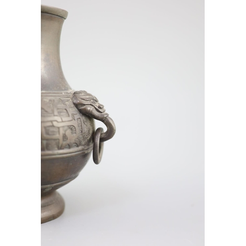 281 - A Chinese archaistic bronze vase, 17th/18th century, cast in low relief with a band of scrolling chi... 