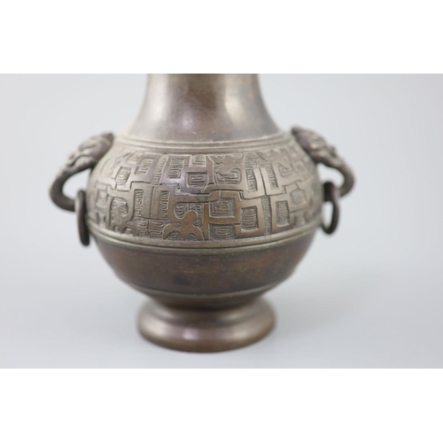 281 - A Chinese archaistic bronze vase, 17th/18th century, cast in low relief with a band of scrolling chi... 