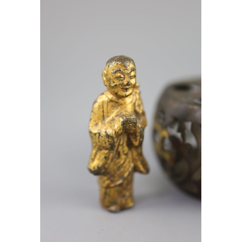 286 - A Chinese bronze drum-shaped stand, a gilt bronze figure of a monk, 17th/18th century and a silver a... 