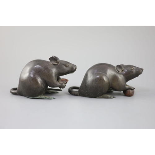 292 - A pair of Japanese bronze models of rats, Meiji period, signed each holding a chestnut, inscribed th... 