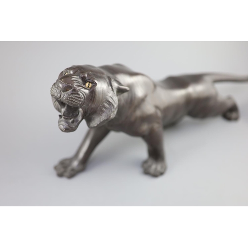 293 - A Japanese bronze figure of a tiger, naturalistically modelled, standing roaring, Meiji period, sign... 