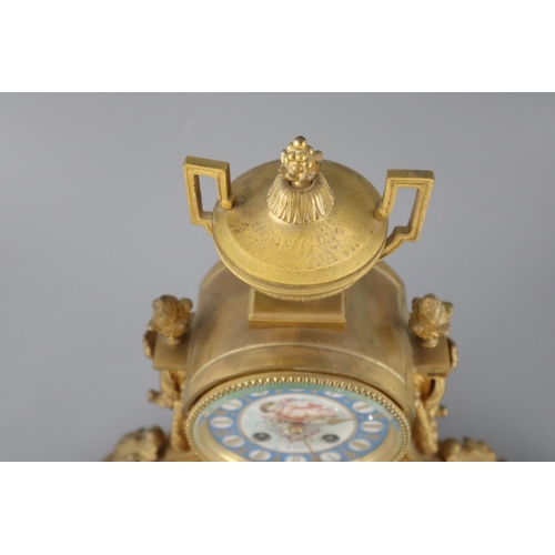 296 - A 19th century Louis XVI style ormolu and Sevres style porcelain clock garniture, the mantel clock o... 