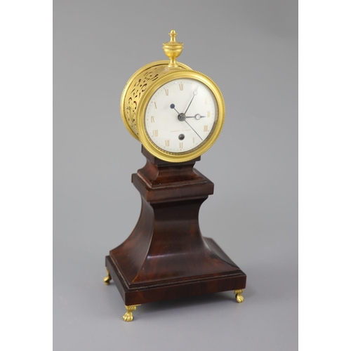 298 - Week's Museum. A Regency gilt brass and mahogany drum case mantel timepiece, with urn final, enamel ... 