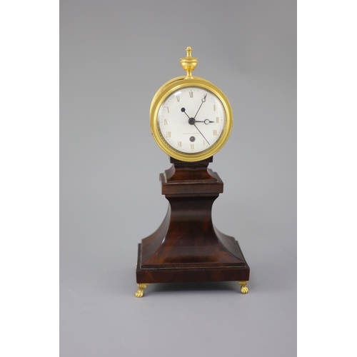 298 - Week's Museum. A Regency gilt brass and mahogany drum case mantel timepiece, with urn final, enamel ... 