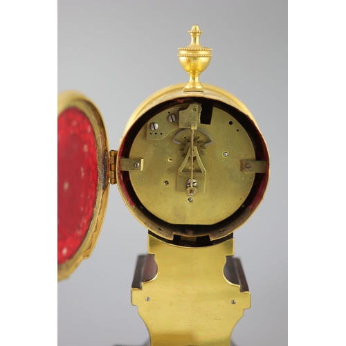 298 - Week's Museum. A Regency gilt brass and mahogany drum case mantel timepiece, with urn final, enamel ... 