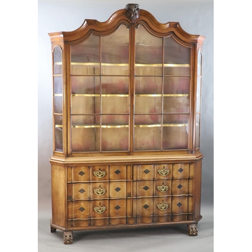 316 - A late 18th century Dutch walnut serpentine vitrine, with moulded serpentine top, two barred glazed ... 