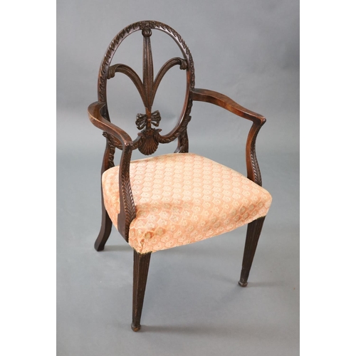 317 - A George III Hepplewhite style mahogany elbow chair, with slender Prince of Wales feather splat, out... 