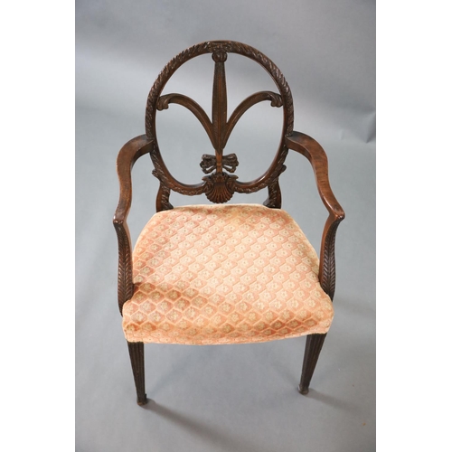 317 - A George III Hepplewhite style mahogany elbow chair, with slender Prince of Wales feather splat, out... 