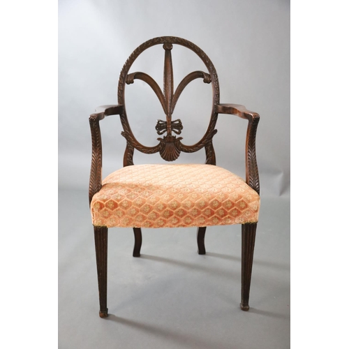 317 - A George III Hepplewhite style mahogany elbow chair, with slender Prince of Wales feather splat, out... 