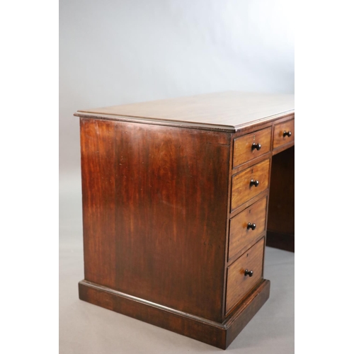 318 - A George III mahogany kneehole desk, with plain rectangular top and nine drawers, fitted knob handle... 