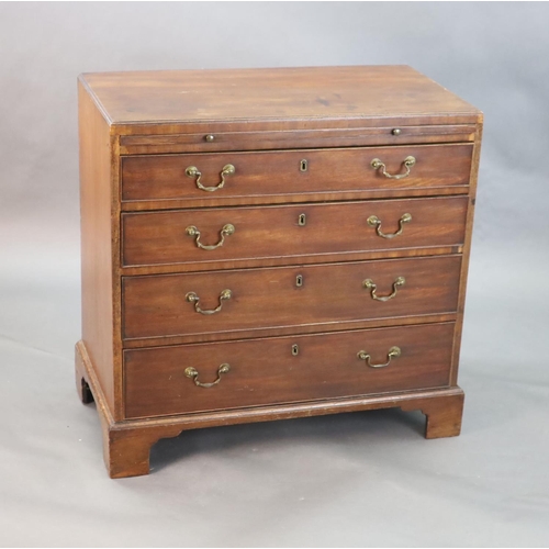 319 - A George III mahogany chest, fitted brushing slide and four graduated long drawers, on bracket feet,... 