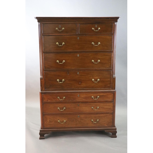 321 - A George III mahogany chest on chest, with dentil cornice, two short and six graduated long drawers,... 