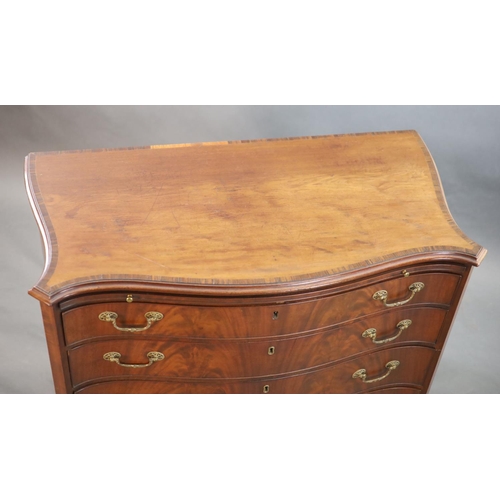 326 - A George III mahogany and rosewood banded serpentine fronted chest, fitted brushing slide and four g... 