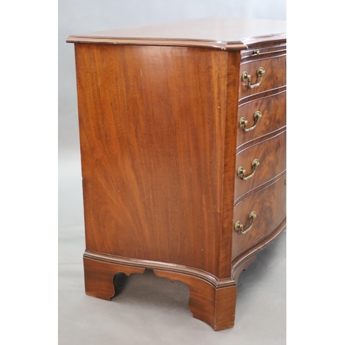 326 - A George III mahogany and rosewood banded serpentine fronted chest, fitted brushing slide and four g... 