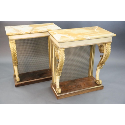 328 - A pair of William IV parcel gilt cream painted and rosewood console tables, with later marble tops a... 