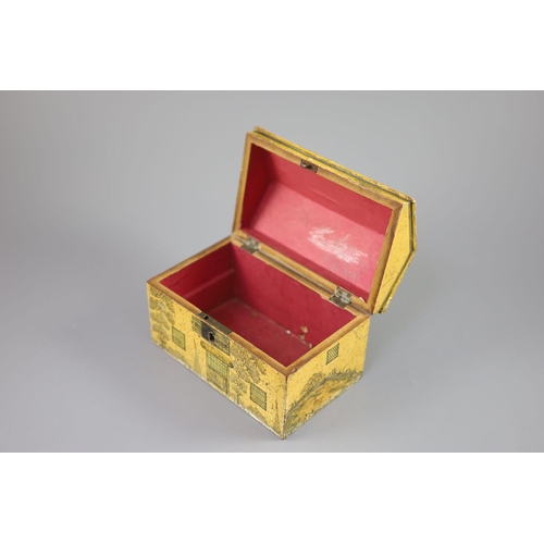 33 - A Regency painted and penwork work box, modelled as a cottage, with leaded windows, plants around th... 