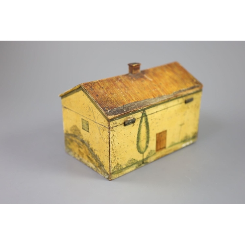 33 - A Regency painted and penwork work box, modelled as a cottage, with leaded windows, plants around th... 