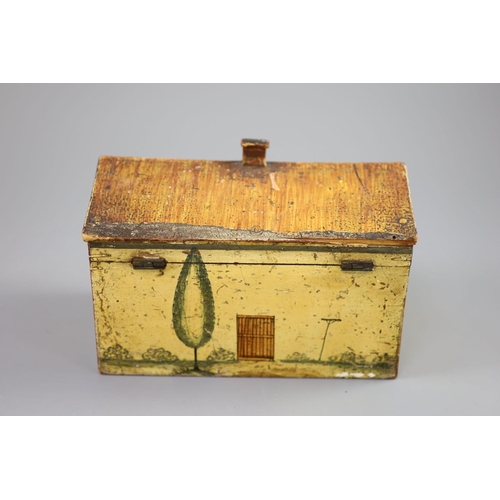 33 - A Regency painted and penwork work box, modelled as a cottage, with leaded windows, plants around th... 