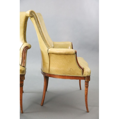 333 - A pair of Regency style leather and mahogany library chairs, with brass studded olive green leather ... 