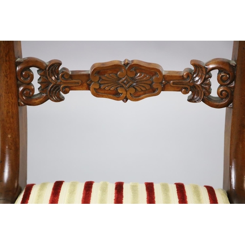 338 - A set of ten William IV mahogany dining chairs including two carvers, with scroll carved frames and ... 