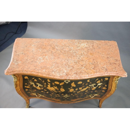 343 - A French Louis XV style kingwood and ormolu mounted serpentine bombe commode, with veined pink marbl... 