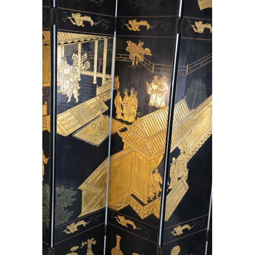 347 - A late 19th century Chinese Coromandel lacquer eight fold dressing screen, decorated to one side wit... 