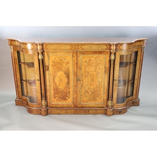 348 - A Victorian figured walnut and marquetry side cabinet, with inlaid frieze and two panelled doors fla... 