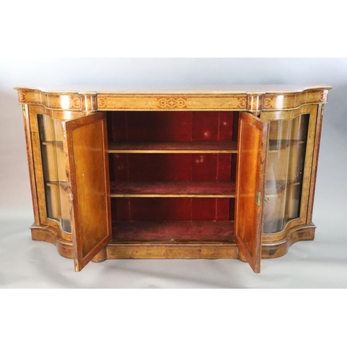 348 - A Victorian figured walnut and marquetry side cabinet, with inlaid frieze and two panelled doors fla... 