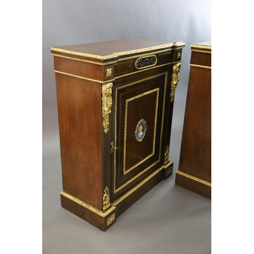 349 - A pair of 19th century French ormolu mounted walnut pier cabinets, inset with pietra dura and porcel... 