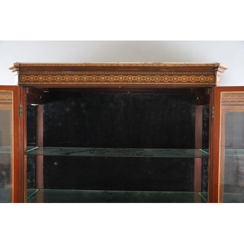 353 - A 19th century French Louis Philippe period kingwood and marquetry vitrine, with moulded cornice and... 