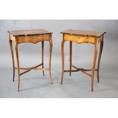 363 - A pair of Louis XVI style ormolu mounted marquetry work tables, with serpentine rectangular tops, on... 