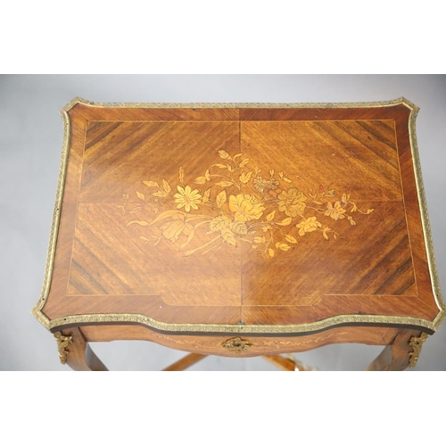 363 - A pair of Louis XVI style ormolu mounted marquetry work tables, with serpentine rectangular tops, on... 