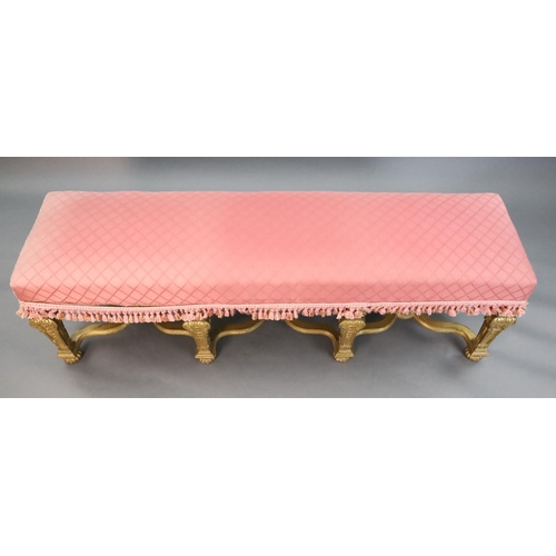 365 - A Louis XIV style carved giltwood stool, with upholstered seat and scroll and harebell carved square... 