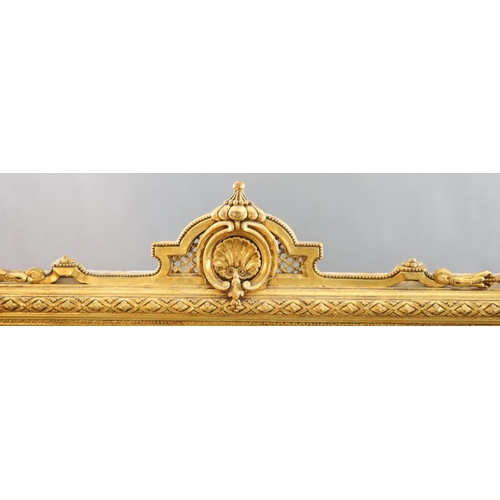 367 - A Victorian gilt gesso overmantel with pierced scallop and scroll crest and foliate motif decorated ... 