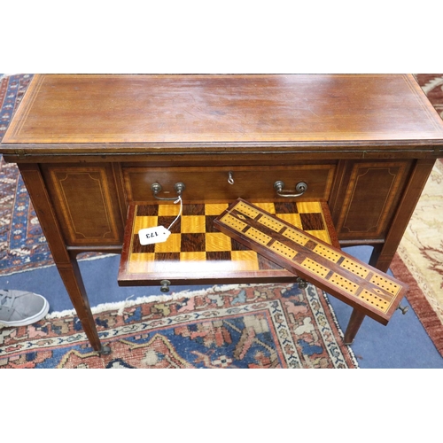 368 - An Edwardian satinwood banded mahogany games/drinks table,
with twin flap swivelling top concealing ... 