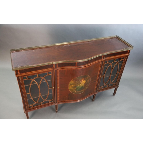 370 - An Edwardian rosewood banded mahogany serpentine dwarf bookcase, with brass gallery and central door... 