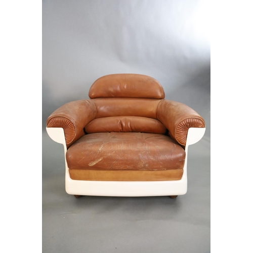 378 - A pair of mid century tan leather and fibreglass tub chairs, possibly French, by Airbourne, W.3ft 1i... 